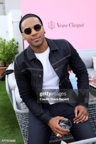 Reggie Yates attends Veuve Clicquot's Brose on the Roof at Selfridges on June 18, 2018 in London, England.