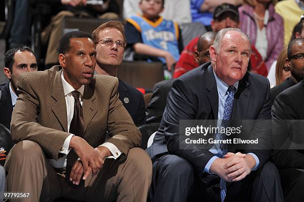 Assistant coach Adrian Dantley and head coach George Karl of the Denver Nuggets react to a play against the Washington Wizards on March 16, 2010 at...