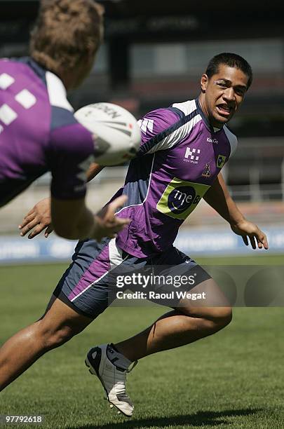 Willie Isa offloads the ball during a Melbourne Storm NRL training session at Princes Park on March 17, 2010 in Melbourne, Australia.