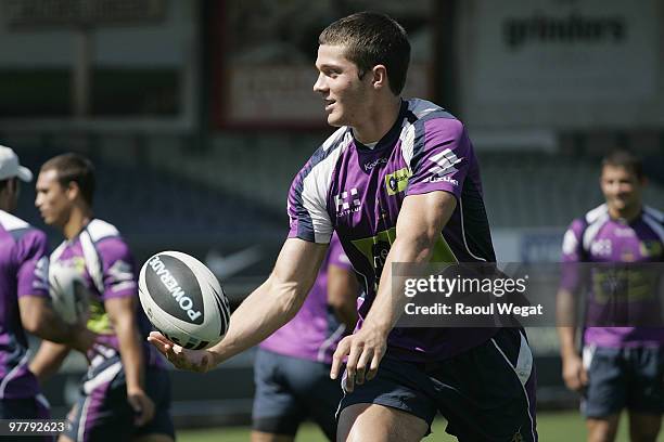 Matt Duffie offloads the ball during a Melbourne Storm NRL training session at Princes Park on March 17, 2010 in Melbourne, Australia.