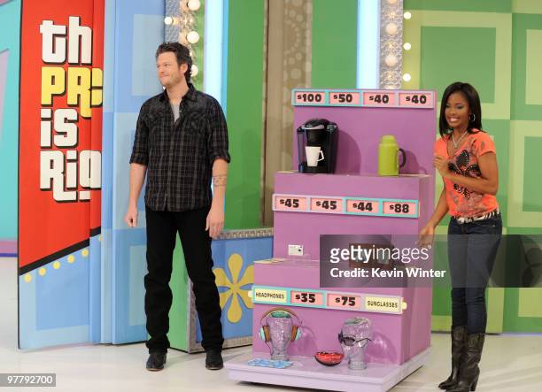 Musician Blake Shelton and model Lanisha Cole appear on "The Price is Right" at CBS Television City on March 16, 2010 in Los Angeles, California.