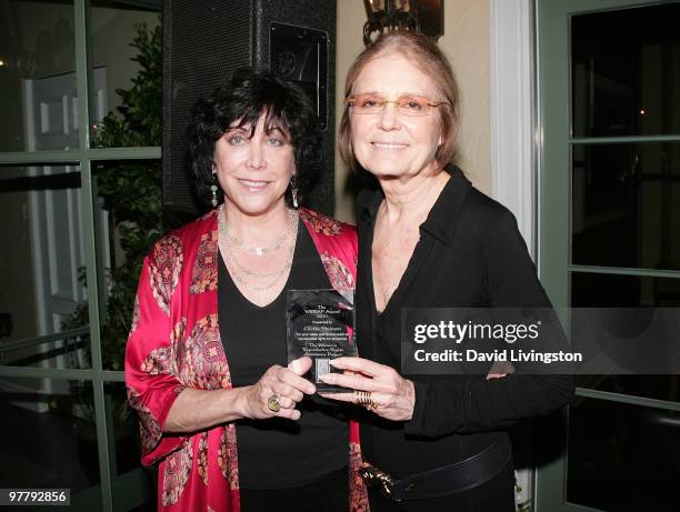 Gloria Steinem poses with her WRRAP award presented to her by WRRAP president Joyce Schorr at An Evening With Gloria Steinem benefiting The Women's...