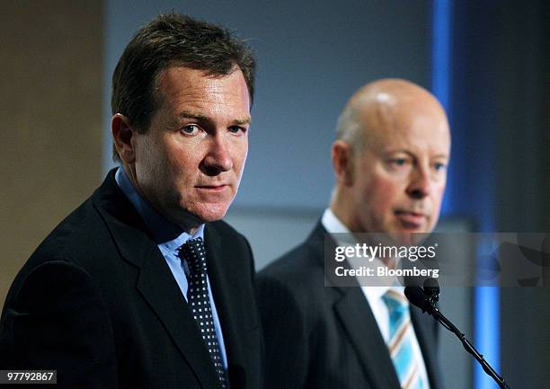 Mark McInnes, chief executive officer of David Jones Ltd., left, and Stephen Goddard, finance director of David Jones Ltd., attend a news conference...