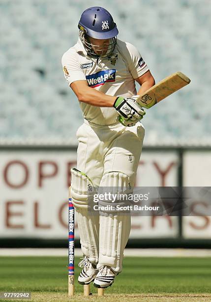 Aaron Finch of the Bushrangers plays a shot during day one of the Sheffield Shield Final between the Victorian Bushrangers and the Queensland Bulls...