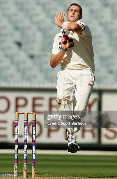 Luke Feldman of the Bulls bowls during day one of the Sheffield Shield Final between the Victorian Bushrangers and the Queensland Bulls at the...