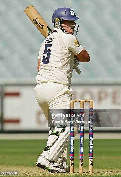 Aaron Finch of the Bushrangers plays a shot during day one of the Sheffield Shield Final between the Victorian Bushrangers and the Queensland Bulls...