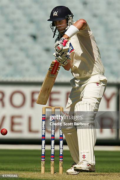 Cameron White of the Bushrangers plays a shot during day one of the Sheffield Shield Final between the Victorian Bushrangers and the Queensland Bulls...