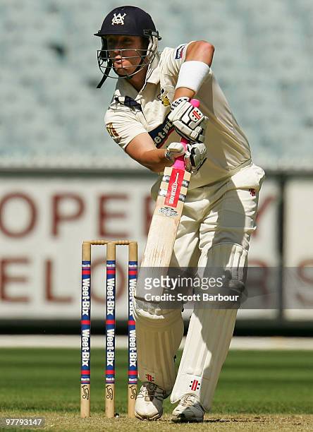 Cameron White of the Bushrangers plays a shot during day one of the Sheffield Shield Final between the Victorian Bushrangers and the Queensland Bulls...