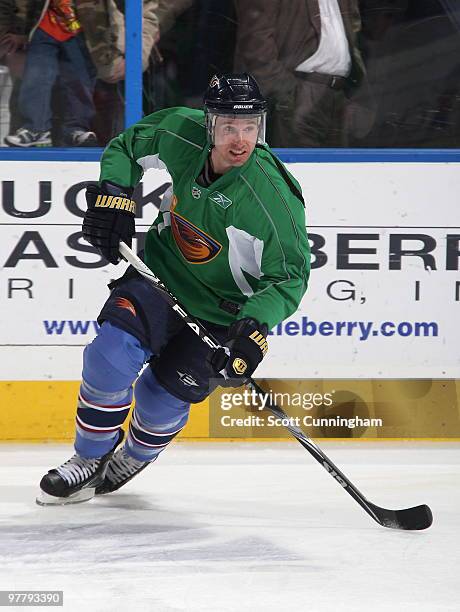 Todd White of the Atlanta Thrashers skates during warmups wearing the Annual St. Patrick's Day Jersey against the Buffalo Sabres at Philips Arena on...