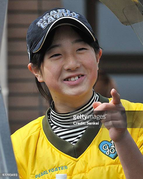 Yoko Ishikawa, young sister of golfer Ryo Ishikawa smiles after the practice round of T Point Ladies Golf Tournament at Kagoshima Takamaki Country...