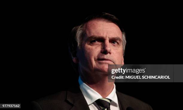 The Brazilian presidential candidate for the Social Liberal Party, Jair Bolsonaro, gestures during the Brazilian Sugarcane Industry Association's...