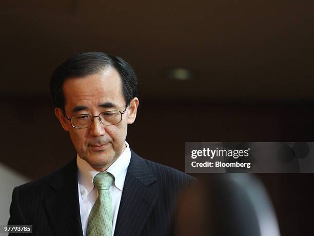 Masaaki Shirakawa, governor of the Bank of Japan, arrives for a news conference in Tokyo, Japan, on Wednesday, March 17, 2010. The Bank of Japan...