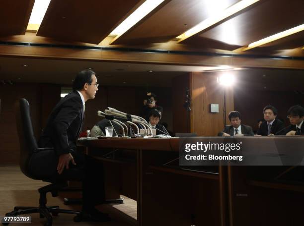 Masaaki Shirakawa, governor of the Bank of Japan, takes his seat as he arrives for a news conference in Tokyo, Japan, on Wednesday, March 17, 2010....