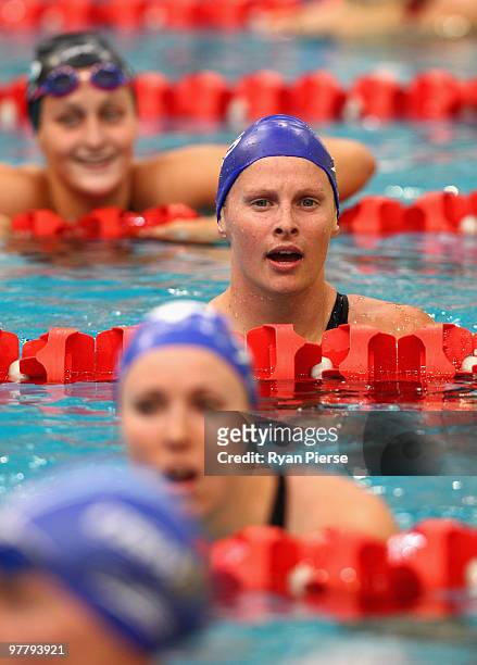 Leisel Jones of Australia exits the pool after winning the Women's 50m Breaststroke Final during day two of the 2010 Australian Swimming...