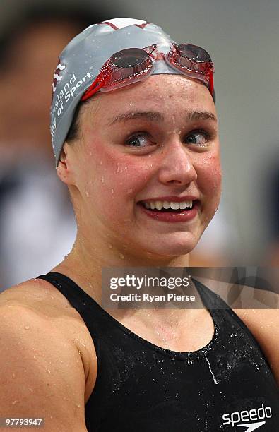 Yolane Kulka of Australia is overcome with emotion after winning the Women's 50m Butterfly Final during day two of the 2010 Australian Swimming...