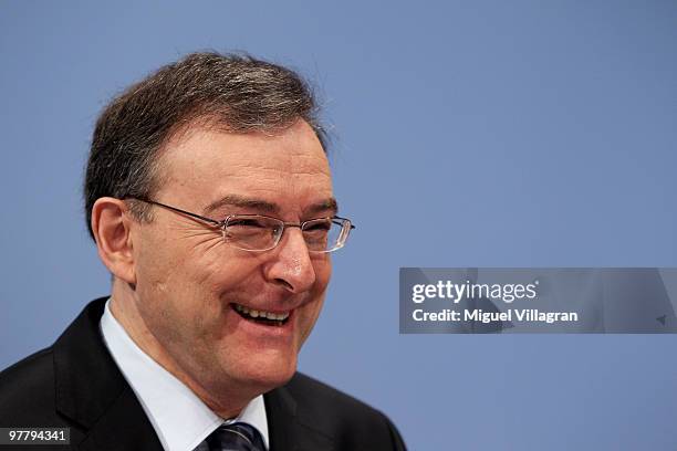 Chairman and CEO Norbert Reithofer laughs during the annual news conference at BMW World on March 17, 2010 in Munich, Germany. BMW Group sold 1.28...