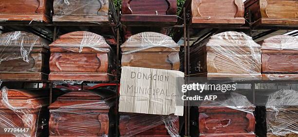 Coffins donated by the municipality for the victims of Saturday's earthquake March 3, 2010 in Constitucion, Chile. The official death toll from...