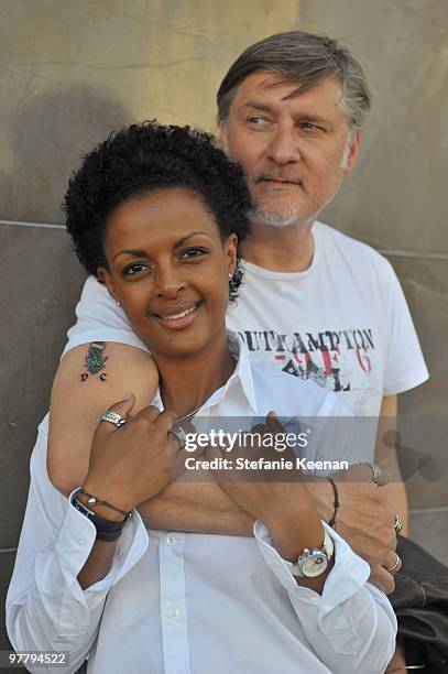 Actress Dennenesch Zoude and husband director Carlo Rola pose for the photographer during their honeymoon on October 23, 2009 in Los Angeles,...