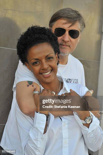 Actress Dennenesch Zoude and husband director Carlo Rola pose for the photographer during their honeymoon on October 23, 2009 in Los Angeles,...