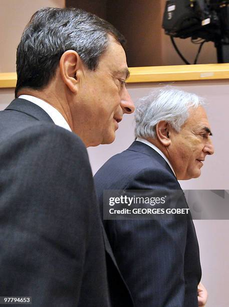 Chairman of the fiancial stabilty board Mario Draghi and International Monetary Fund managing director Dominique Strauss-Kahn arrive for a high-level...