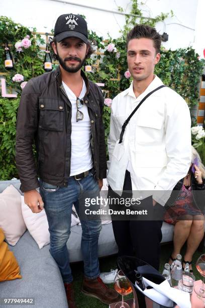 Tommy Clarke and Harvey Newton-Haydon attend Veuve Clicquot's Brose on the Roof at Selfridges on June 18, 2018 in London, England.