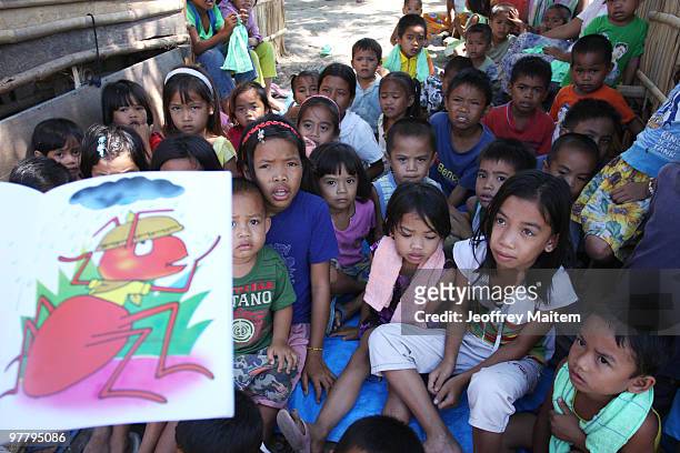 Filipino Muslim kids affected by the fighting between Philippine security forces and Muslim rebels are seen after undergoing psychological...