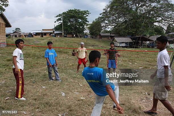 Filipino Muslim teenagers affected by the fighting between Philippine security forces and Muslim rebels are seen playing after undergoing...