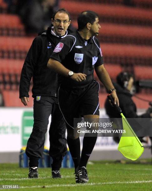 Aston Villa manager Martin O'Neill shouts towards the referee's assistant Mo Matadar during the English Premier league football match at the DW...