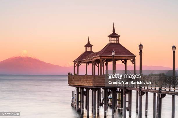 llanquihue lake and pier at sunrise, osorno, los lagos, chile - llanquihue lake stock pictures, royalty-free photos & images