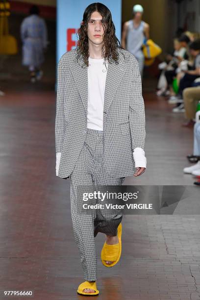 Model walks the runway at the Marni fashion show during Milan Men's Fashion Week Spring/Summer 2019 on June 16, 2018 in Milan, Italy.