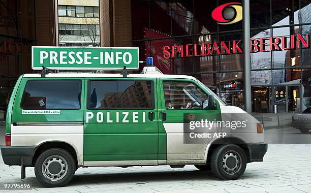 - Picture taken on March 6, 2010 shows a Police press information vehicle is parked in front of the "Spielbank" casino at Potsdamer Plarz in Berlin....