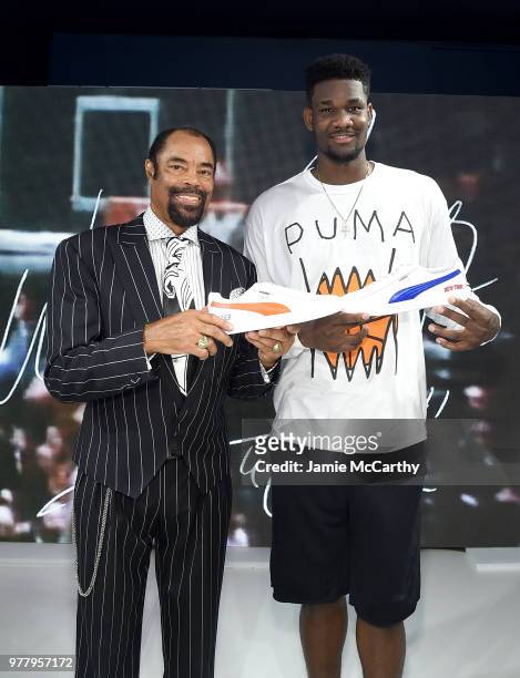 Walt "Clyde" Frazier and Deandre Ayton attend the PUMA Hoops HQ kickoff where Walt "Clyde" Frazier signs the first ever life long contract with PUMA...