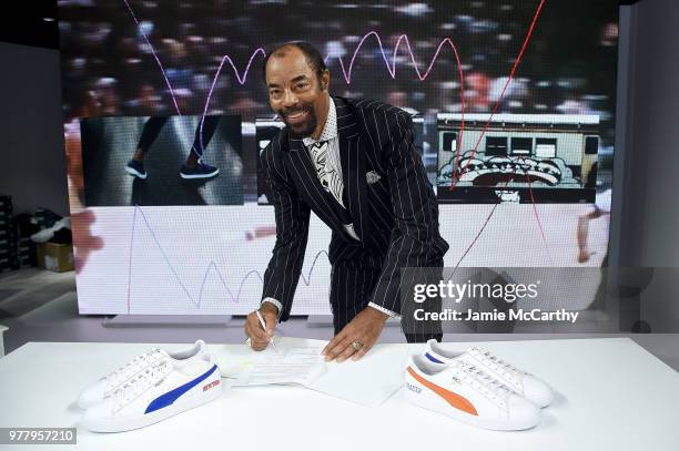 Walt "Clyde" Frazier signs the first ever life long contract with PUMA at the PUMA Hoops HQ kickoff on June 18, 2018 in Brooklyn.