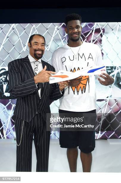 Walt "Clyde" Frazier and Deandre Ayton attend the PUMA Hoops HQ kickoff where Walt "Clyde" Frazier signs the first ever life long contract with PUMA...