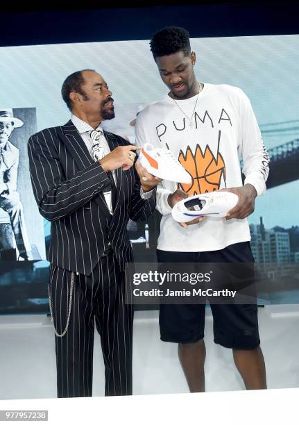 Walt "Clyde" Frazier and Deandre Ayton attend the PUMA Hoops HQ kickoff where Walt "Clyde" Frazier signs the first ever life long contract with PUMA...