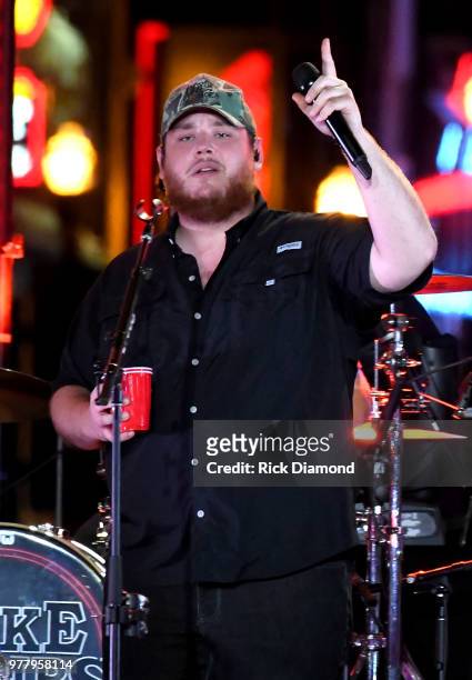 Luke Combs performs at CMT Crossroads at The Stage On Broadway on June 5, 2018 in Nashville, Tennessee.