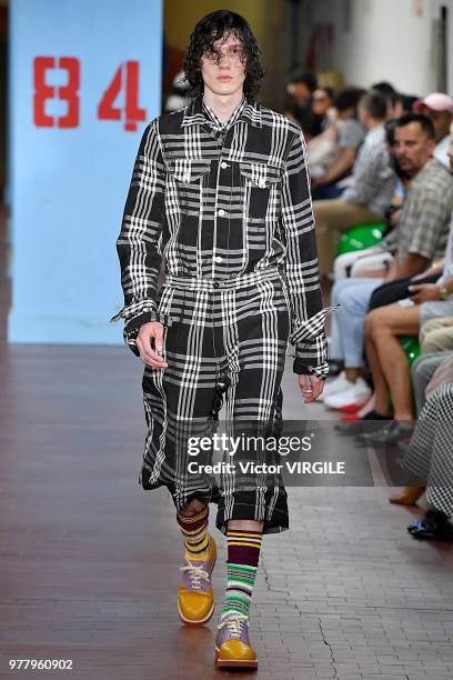 Model walks the runway at the Marni fashion show during Milan Men's Fashion Week Spring/Summer 2019 on June 16, 2018 in Milan, Italy.