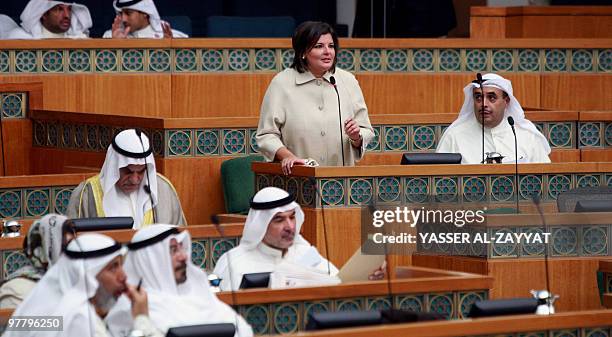 Kuwaiti MP Aseel al-Awadhi speaks during a parliament session in Kuwait City on March 17, 2010. Ten MPs filed a no-confidence motion against Kuwaiti...