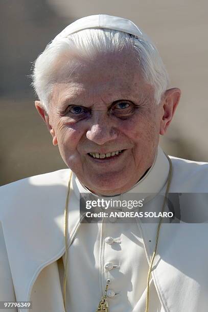 Pope Benedict XVI stands in his Papamobile as he arrives for his weekly general audience on March 17, 2010 at St Peter's square at The Vatican. Pope...