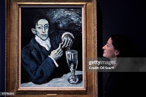 Giovanna Bertazzoni, the Head of Impressionist and Modern Art Department for Christie's, admires a 1903 painting by Pablo Picasso entitled 'Portrait...