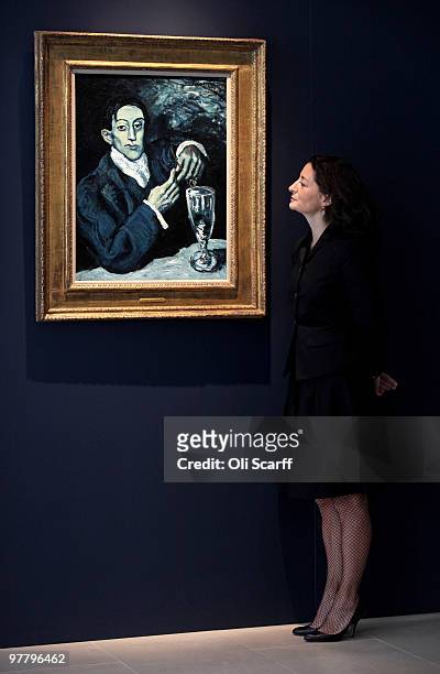 Giovanna Bertazzoni, the Head of Impressionist and Modern Art Department for Christie's, admires a 1903 painting by Pablo Picasso entitled 'Portrait...