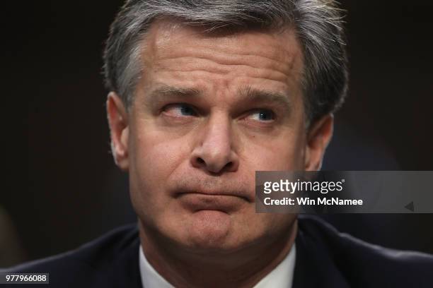 Federal Bureau of Investigation Director Christopher Wray testifies before the Senate Judiciary Committee on Capitol Hill June 18, 2018 in...