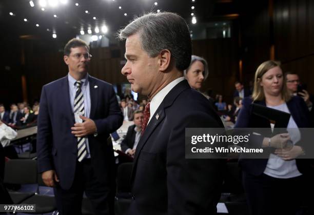 Federal Bureau of Investigation Director Christopher Wray arrives for testimony before the Senate Judiciary Committee on Capitol Hill June 18, 2018...