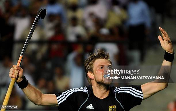 German hockey player Moritz Furste reacts after scoring the equaliser against Australia during their World Cup 2010 Final match at the Major Dhyan...