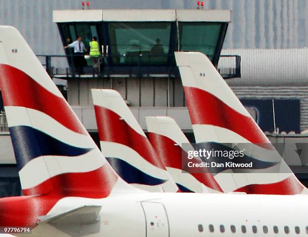 British Airways' airplanes sit on the runway at London City Airport on March 17, 2010 in London, England. Unite Union leaders are due to talk with...