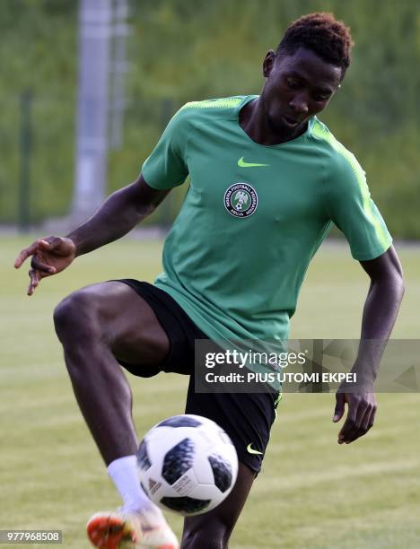 Nigeria's midfielder Onyinye Ndidi controls the balls during a training session at Essentuki Arena in Yessentuki, southern Russia, on June 18, 2018...