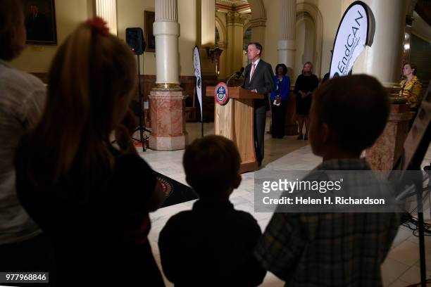 Colorado Governor John Hickenlooper speaks during a press conference inside the west foyer of the State Capitol on June 18, 2018 in Denver, Colorado...