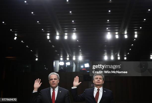 Federal Bureau of Investigation Director Christopher Wray and Justice Department Inspector General Michael Horowitz are sworn in prior to testimony...