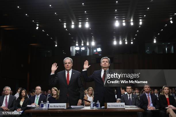 Federal Bureau of Investigation Director Christopher Wray and Justice Department Inspector General Michael Horowitz are sworn in prior to testimony...