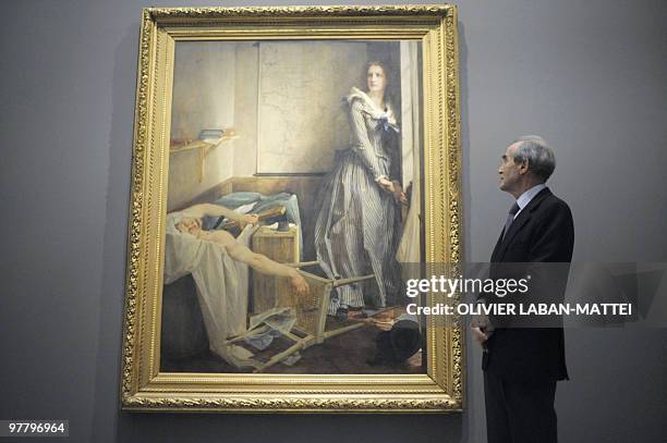French former President of the Constitutional council, socialist Robert Badinter, looks at "L'assassinat de Marat" by French painter Paul Baudry,...